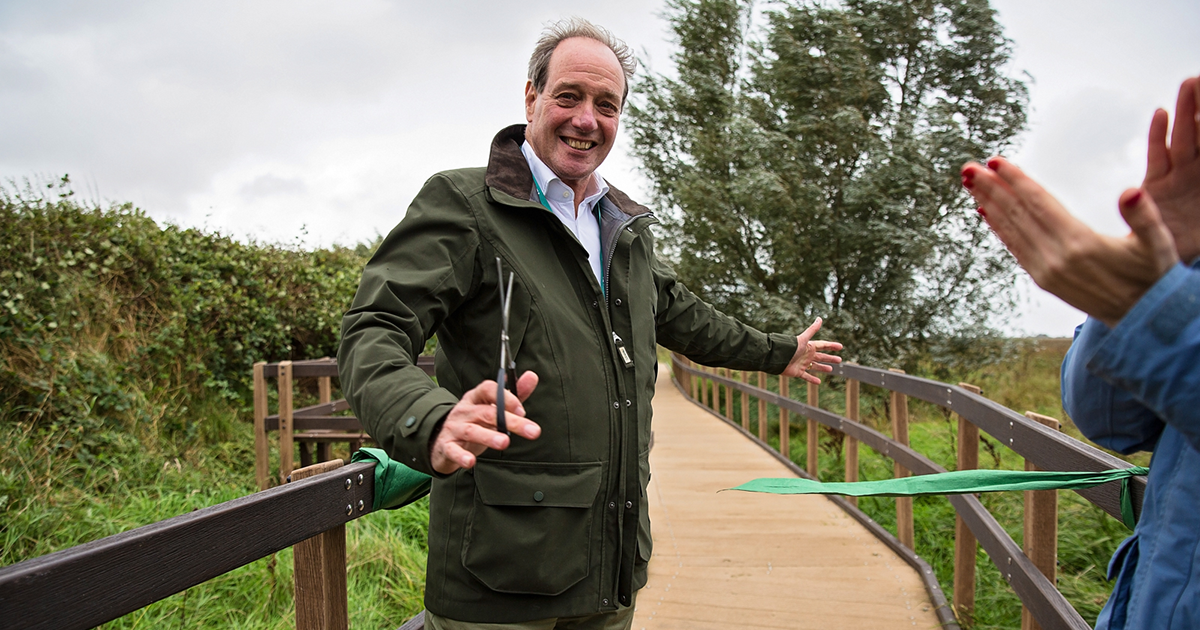 WEB Andrew cuts ribbon