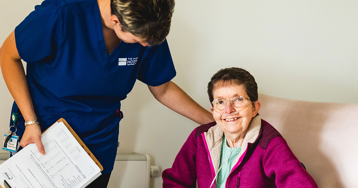 WEB Emma Shaw, occupational therapist, with a patient